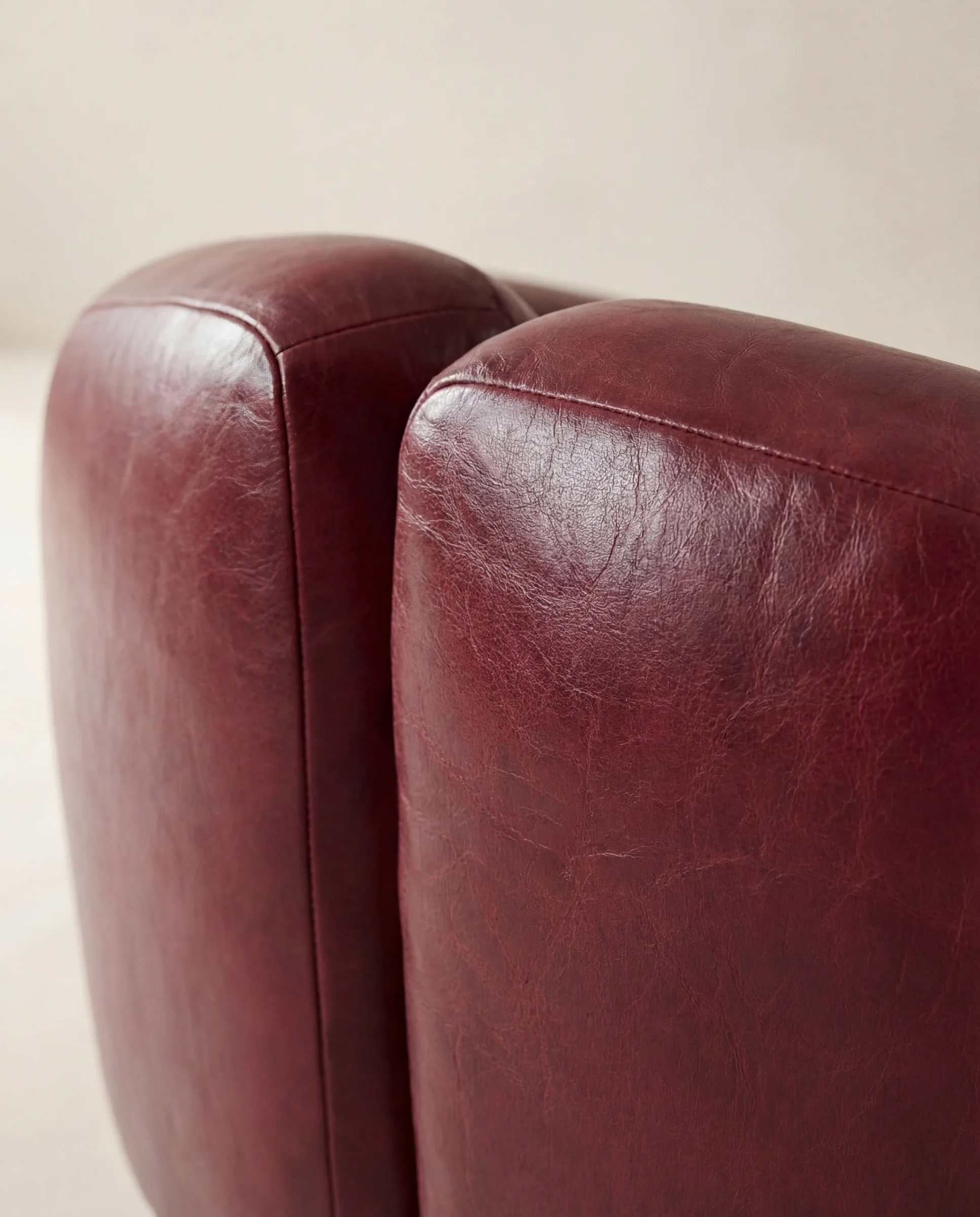 Burgundy armchair backrest detail