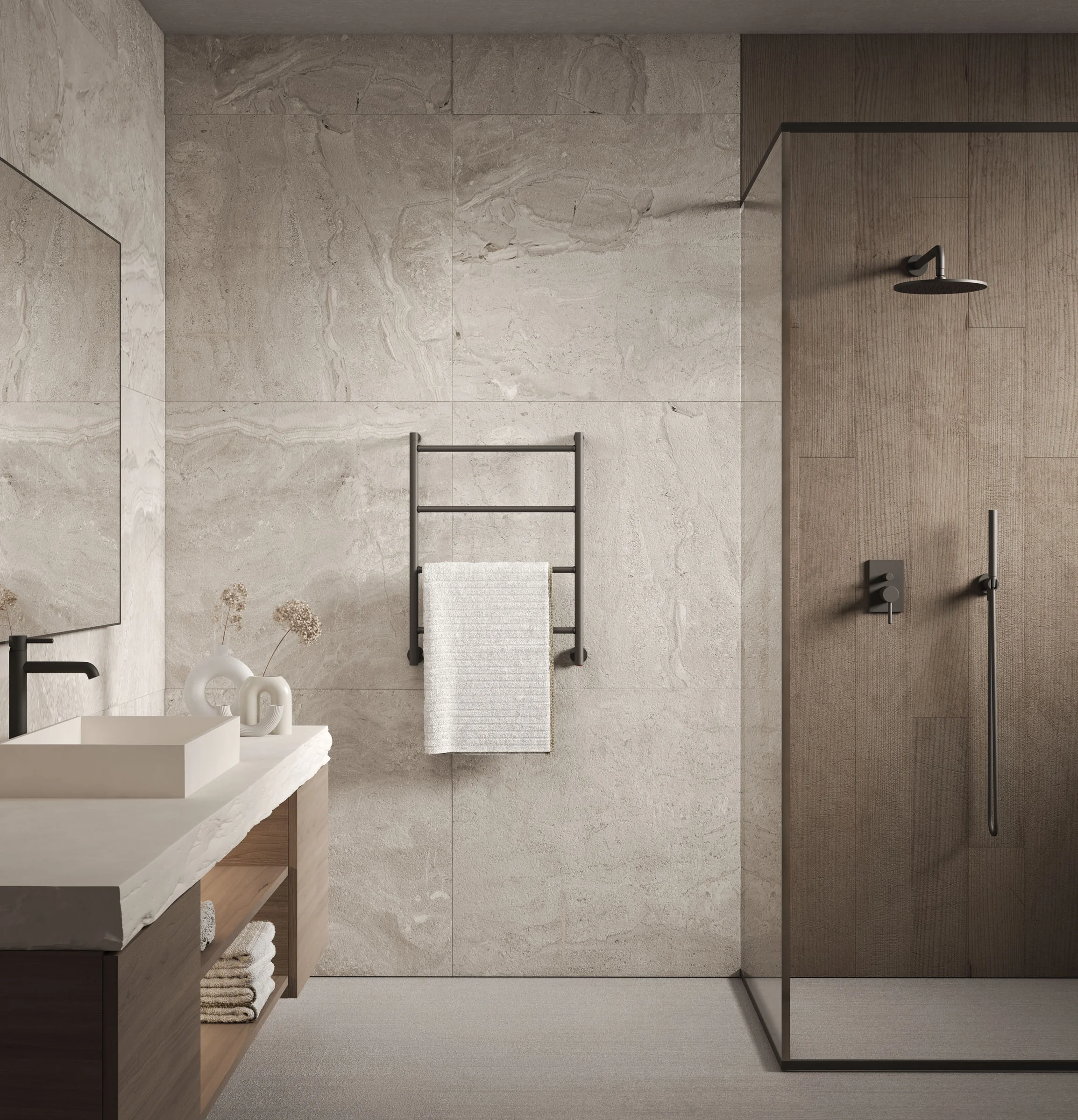 Margaroli towel warmer on pale stone cladding